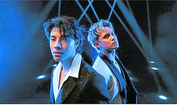 Benjamin Kheng (left) and Reid in “Rock Bottom Blues”
