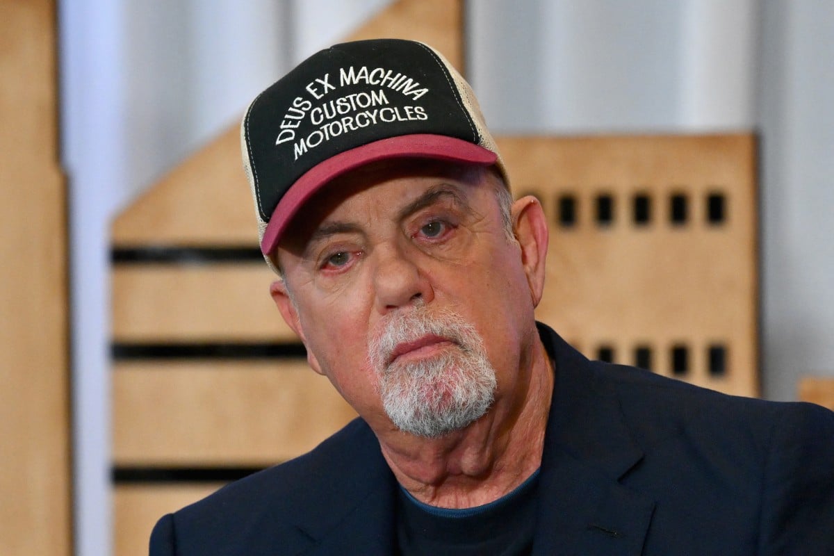(FILES) Singer Billy Joel announces the end of his residency at Madison Square Garden in 2024 during a press conference on June 1, 2023, in New York. Joel is cancelling a series of global tour dates after being diagnosed with a brain condition that worsened because of recent performances, his staff said on May 23, 2025. "Billy Joel has announced that he will be cancelling all scheduled concerts following a recent diagnosis of Normal Pressure Hydrocephalus (NPH)," the Piano Man's team wrote on his website. (Photo by ANGELA WEISS / AFP)
