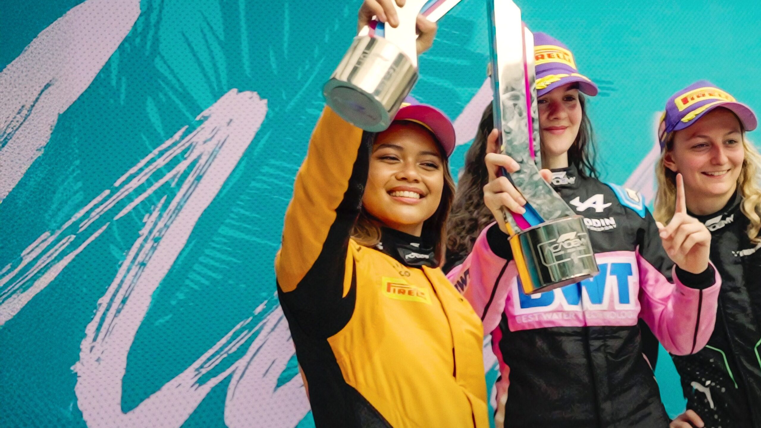(From left) Bianca Bustamante, Abbi Pulling, and Doriane Pin in "F1: The Academy." Image: Courtesy of Netflix 